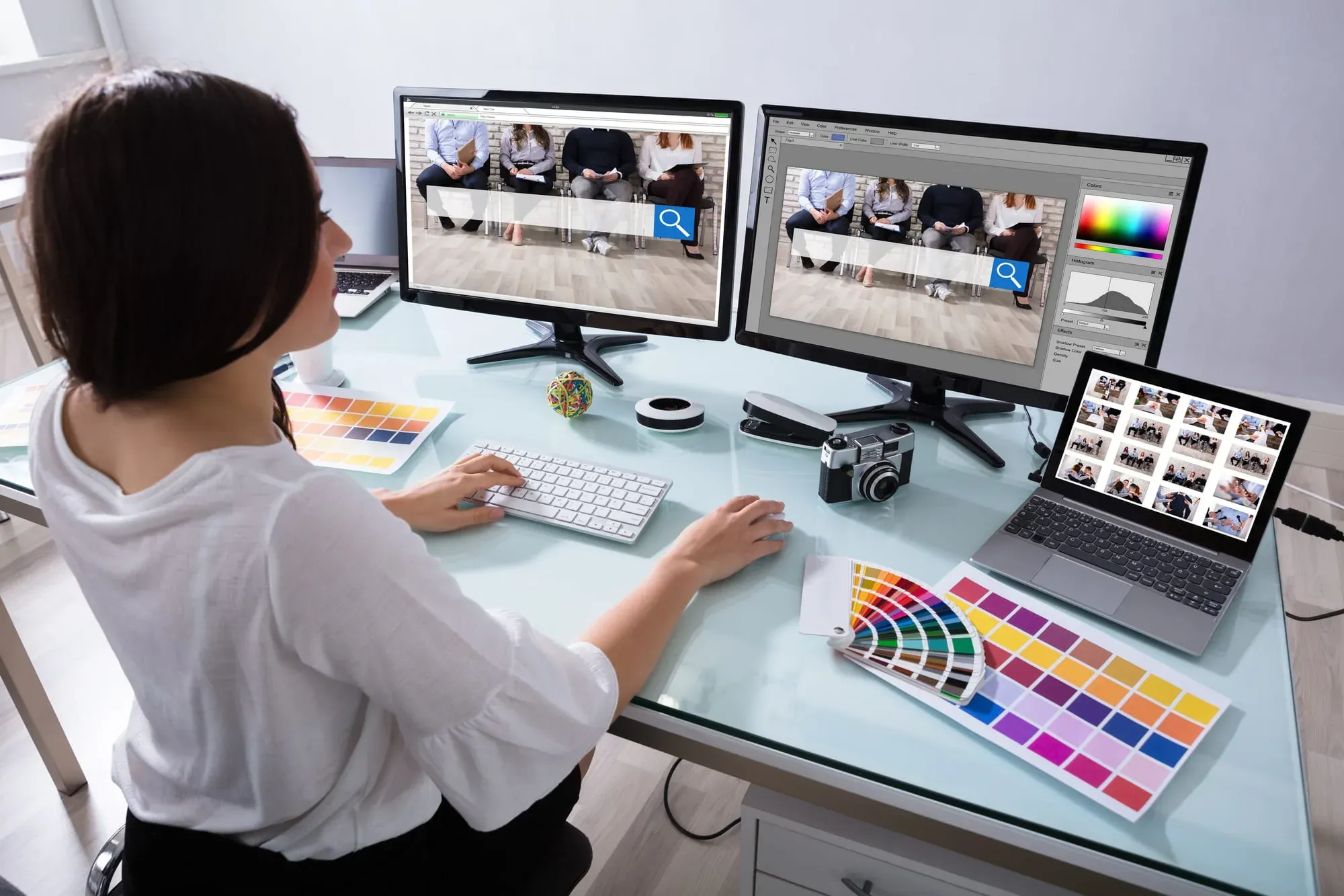 Designer Working On Multiple Computer